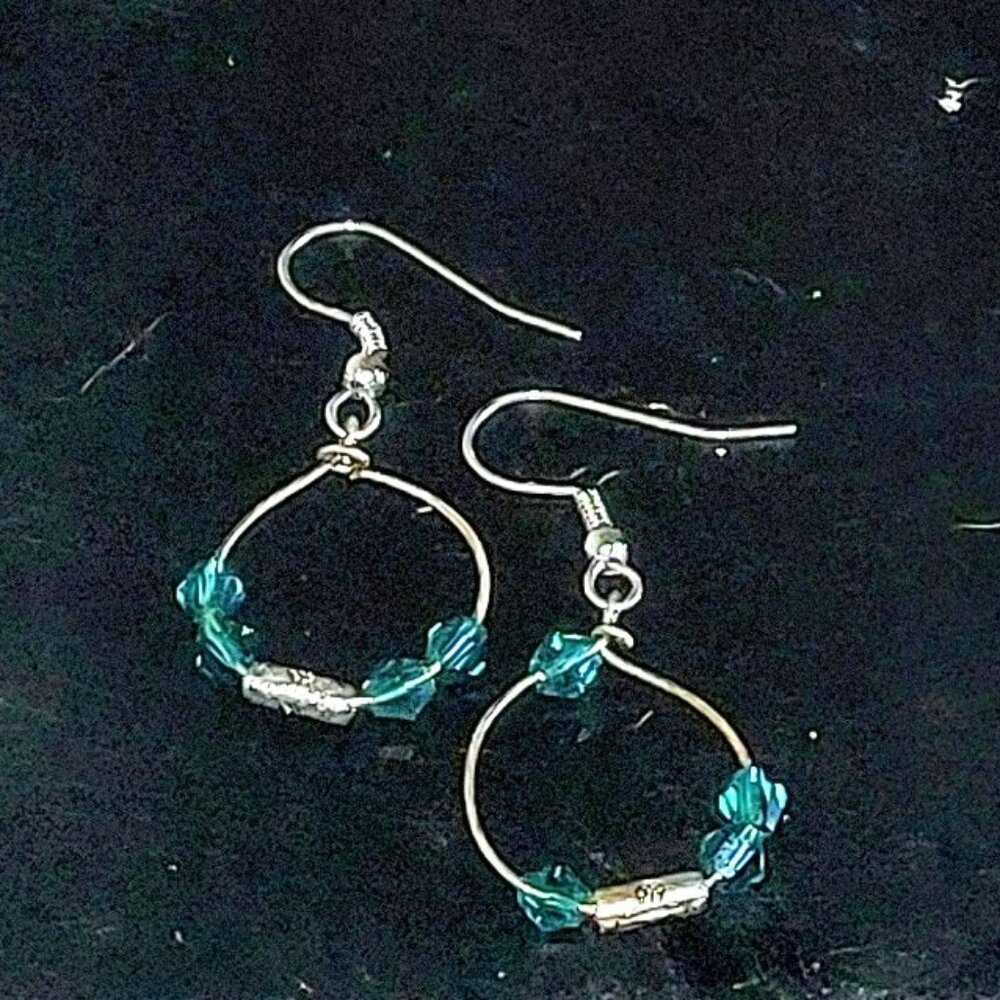 Earrings from glass and metal